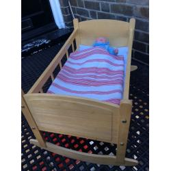 Wooden toy rocking crib