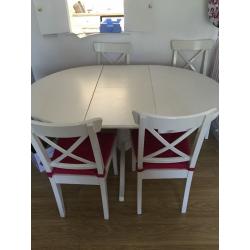 IKEA white extendable table and 6 chairs