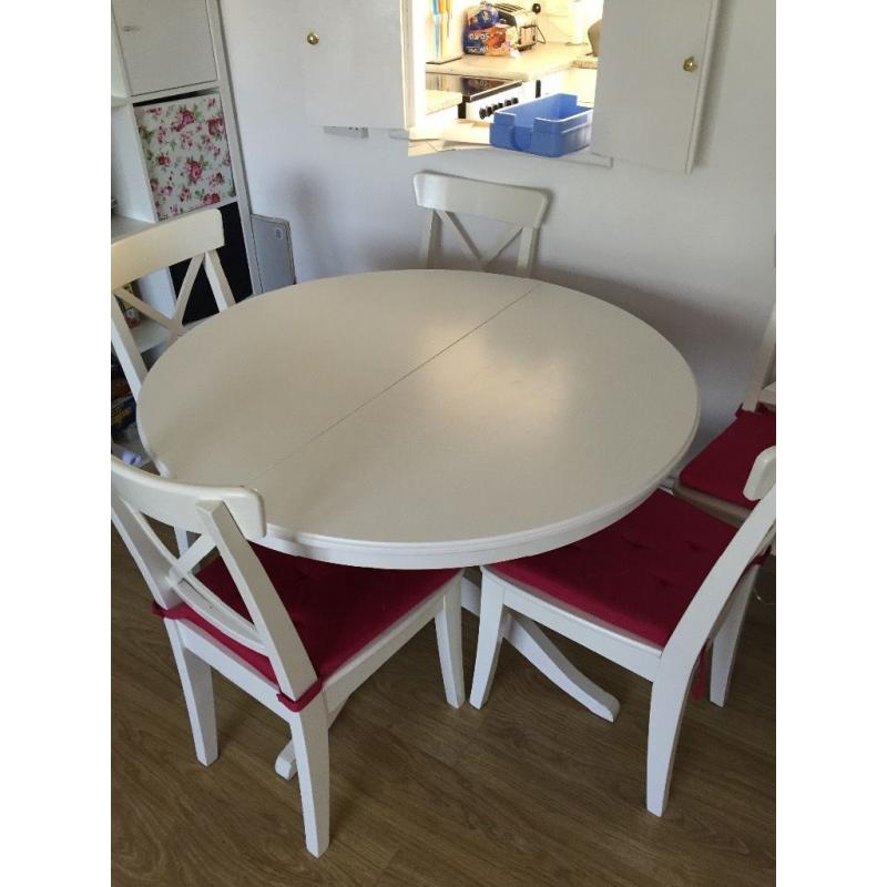 IKEA white extendable table and 6 chairs