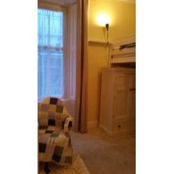 Bright, double room with lots of storage and small double high sleeper. Available to students