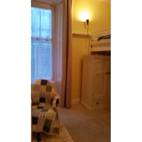 Bright, double room with lots of storage and small double high sleeper. Available to students