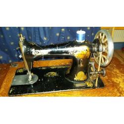 antique singer sewing machine with original cabinet
