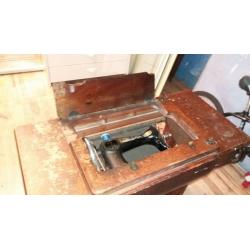 antique singer sewing machine with original cabinet