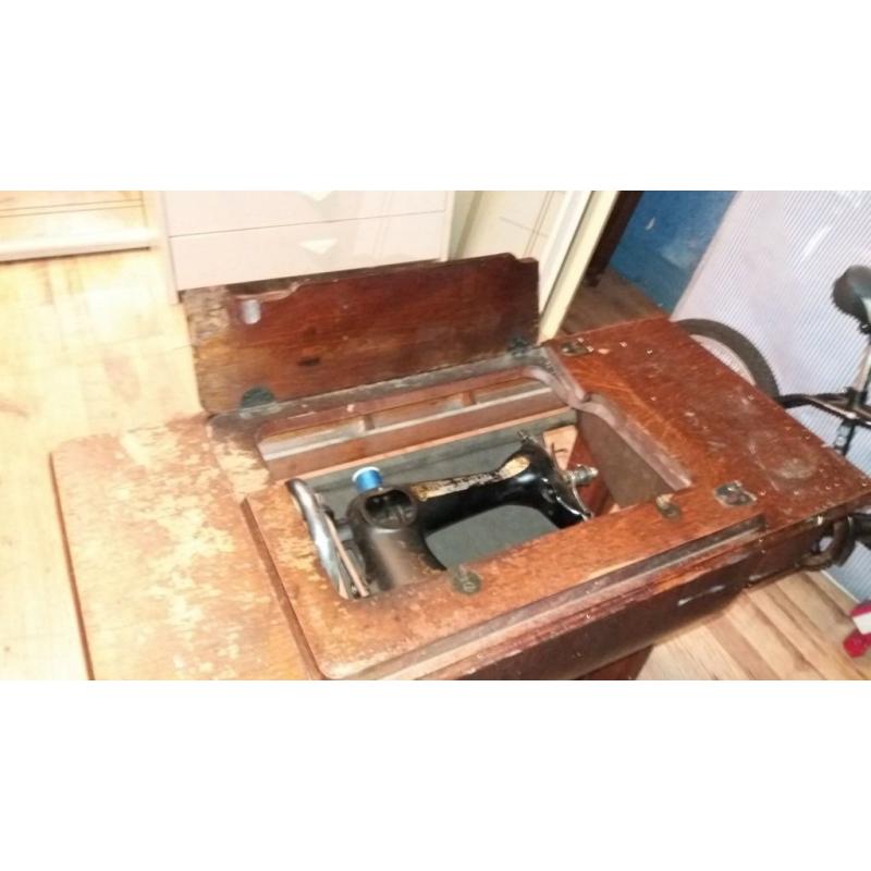 antique singer sewing machine with original cabinet