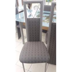 Glass table and six chairs in excellent condition buyer collects