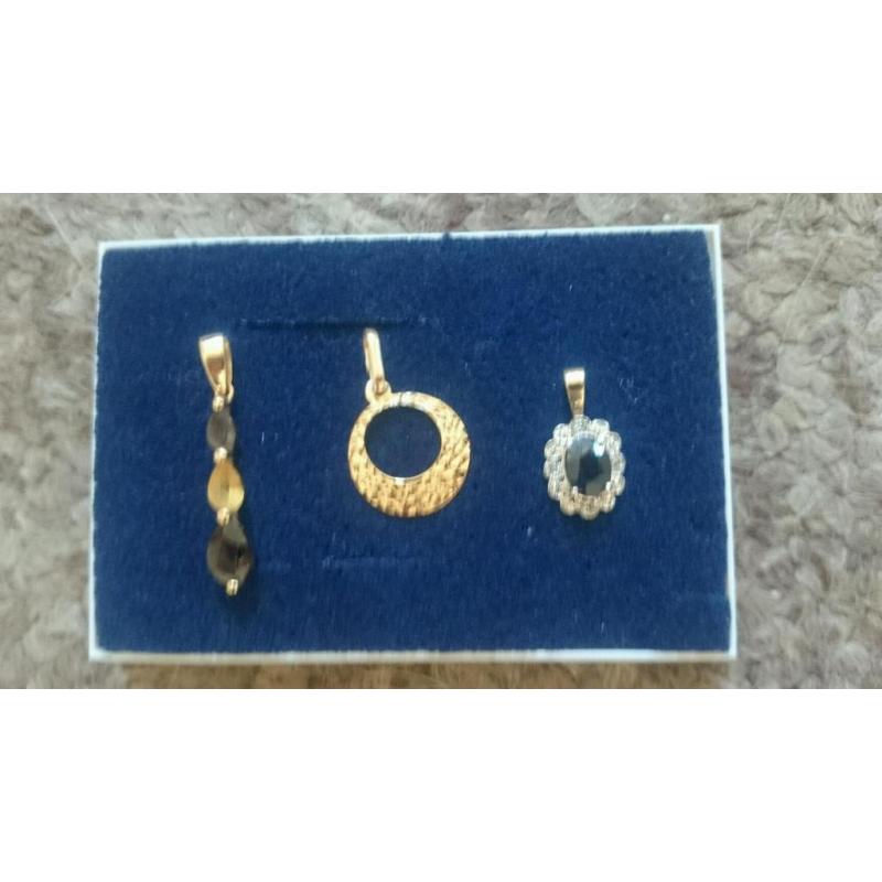 Gold pendants