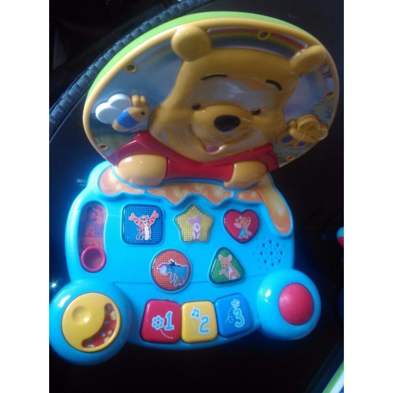 Winnie the pooh laptop and other activity toys, great condition, bargain