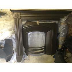 Cast iron fireplace plus basket and hearth