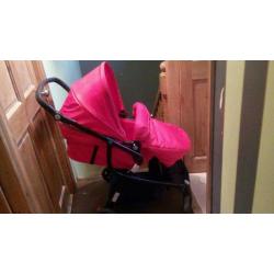 Red pushchair suitable from birth