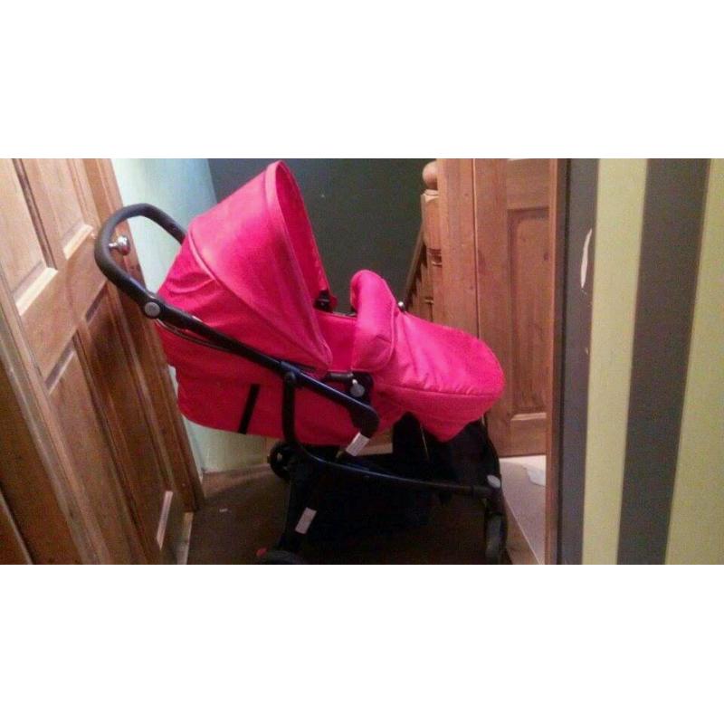 Red pushchair suitable from birth