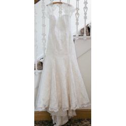 Beautiful Sassi Holford Serena lace wedding dress with shrug and veil