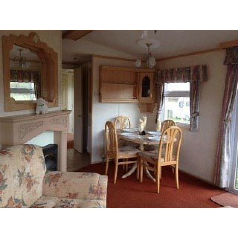 2 bedroom, double glazed and central heated caravan for sale on a stunning country park. low fee's