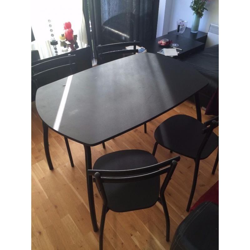 Black Table with 4 table chairs - Good Condition