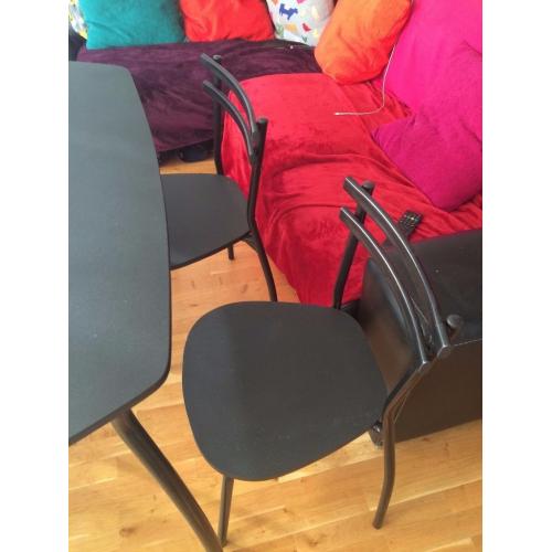 Black Table with 4 table chairs - Good Condition