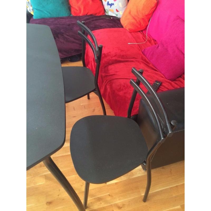 Black Table with 4 table chairs - Good Condition