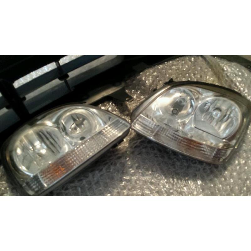 Nissan Almera 05 brand new bumper. 2 lights and 2 grills