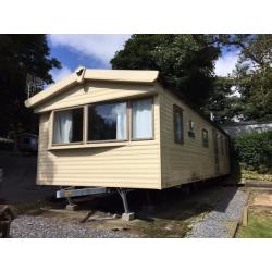 Cheap 3 bed caravan at Lydstep, nr Tenby, Sea views only a stones throw from beach