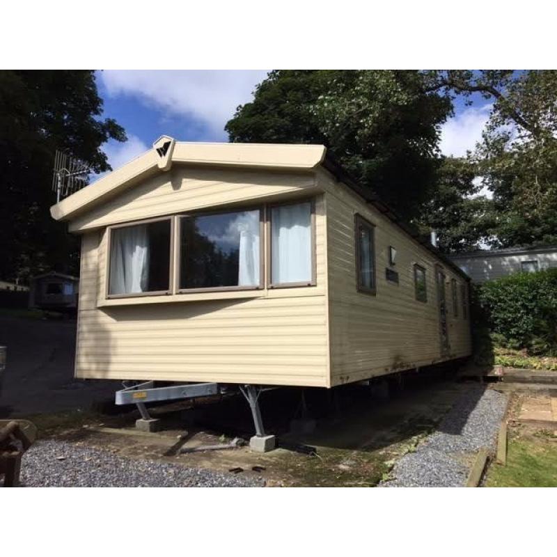 Cheap 3 bed caravan at Lydstep, nr Tenby, Sea views only a stones throw from beach