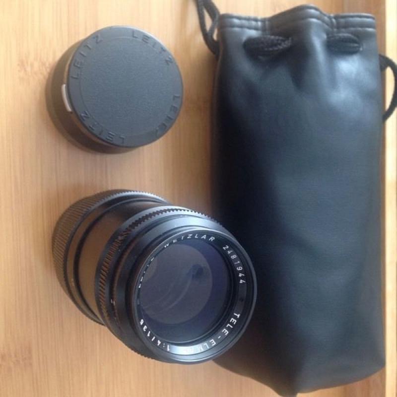 Leica, Leitz Wetzlar Tele-Elmar 1:4/135 lens, hood, lens caps and bag.