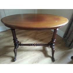 OVAL MAHOGANY 'STRETCHER' OCCASIONAL TABLE