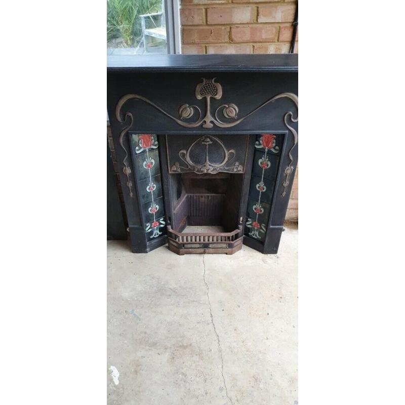 Beautiful Art Deco heavy cast iron fireplace, tiles and surround