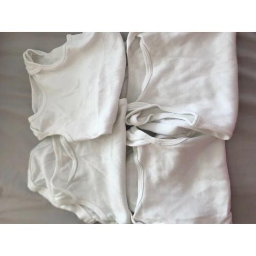 4 white sleeveless baby vest