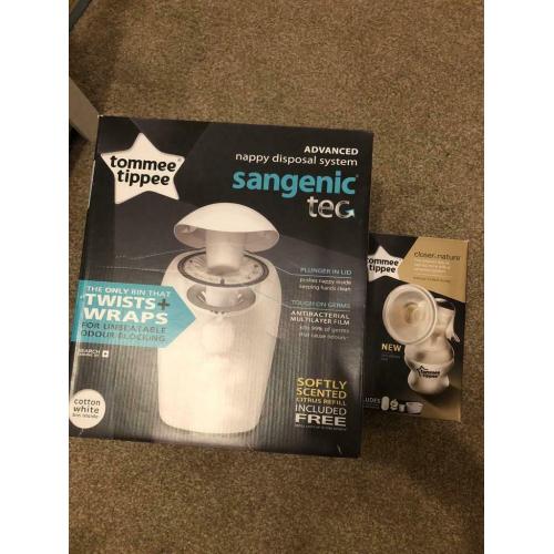 Nappy system and manual breast pump