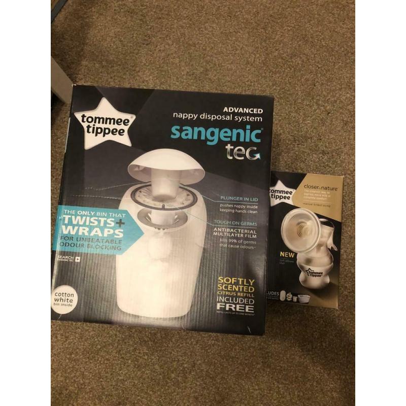 Nappy system and manual breast pump