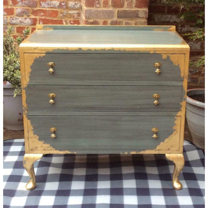 Solid wood French style chest of drawers with golden leaf and brass tear drop handles