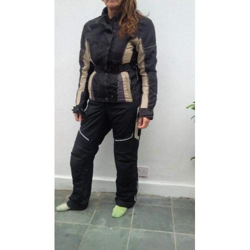 nearly new jacket and trousers suit a size 10to 12 female ?100.00