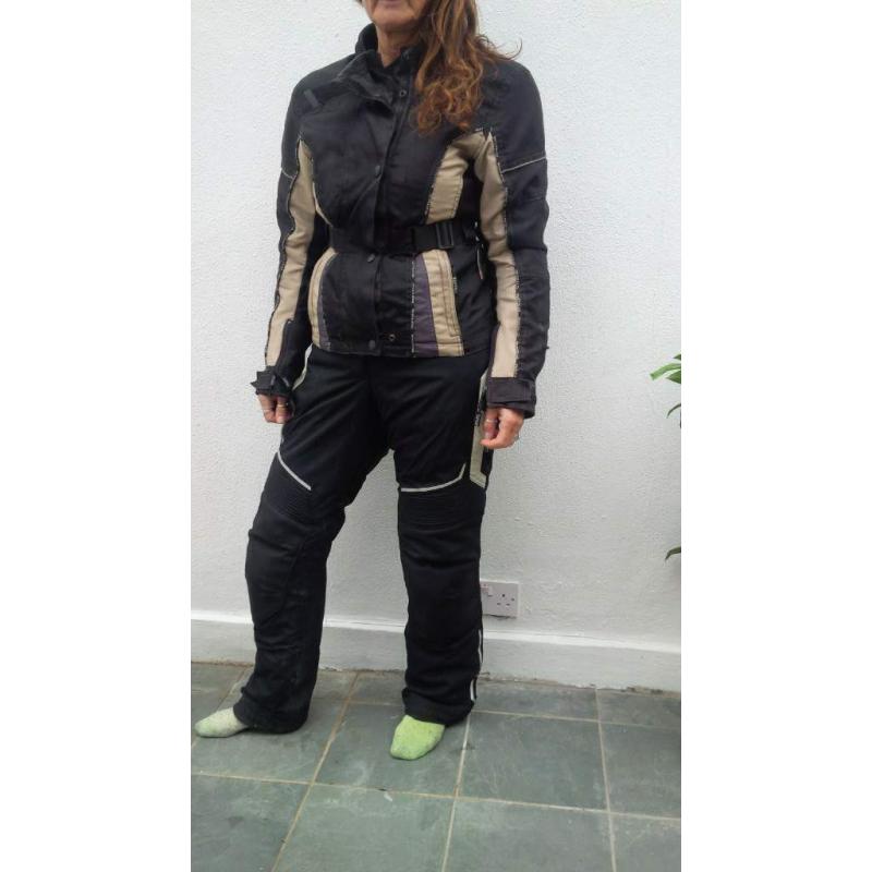 nearly new jacket and trousers suit a size 10to 12 female ?100.00