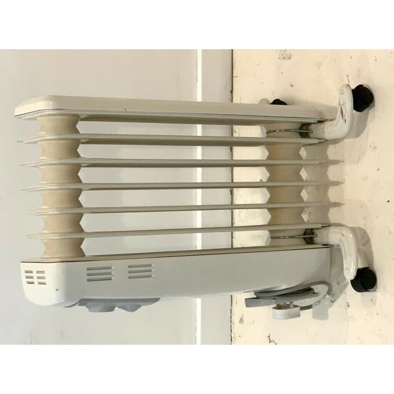 Portable electric radiator: Dimplex OFC1500 - Portable Oil Filled Radiator, 1500W