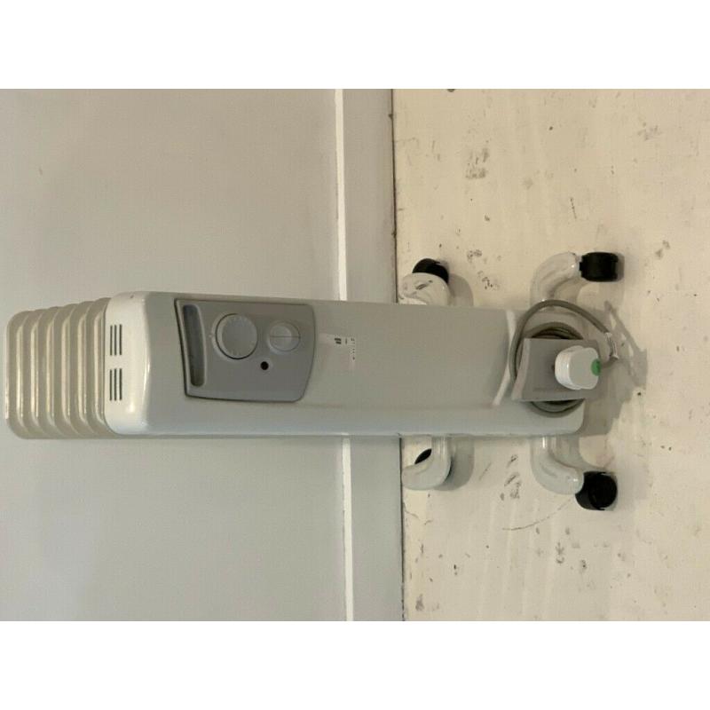 Portable electric radiator: Dimplex OFC1500 - Portable Oil Filled Radiator, 1500W