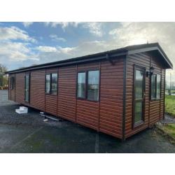LOG CABIN LODGE FOR SALE OFF SITE