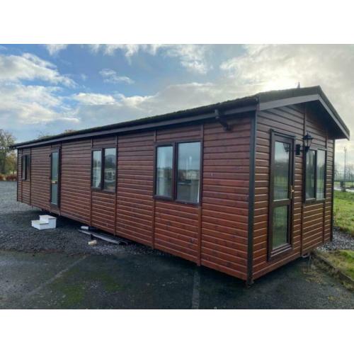 LOG CABIN LODGE FOR SALE OFF SITE