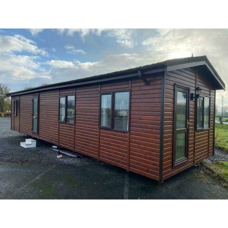 LOG CABIN LODGE FOR SALE OFF SITE