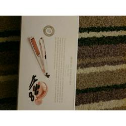 Cosmopolitan argan oil infused straighteners reduced