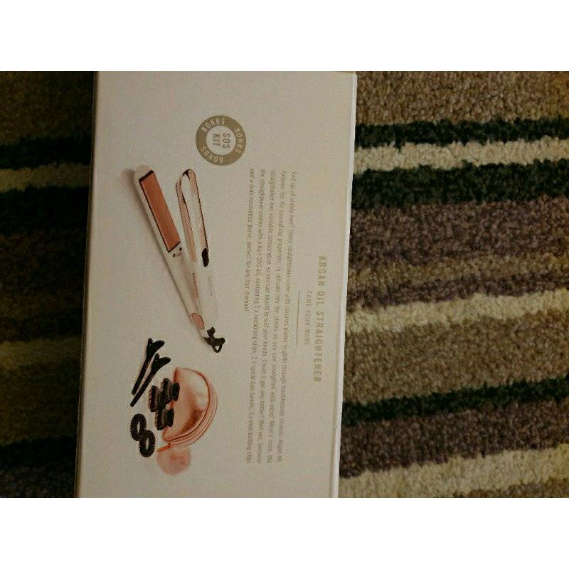 Cosmopolitan argan oil infused straighteners reduced
