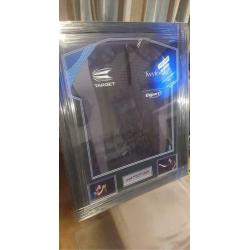 Signed framed darts shirts