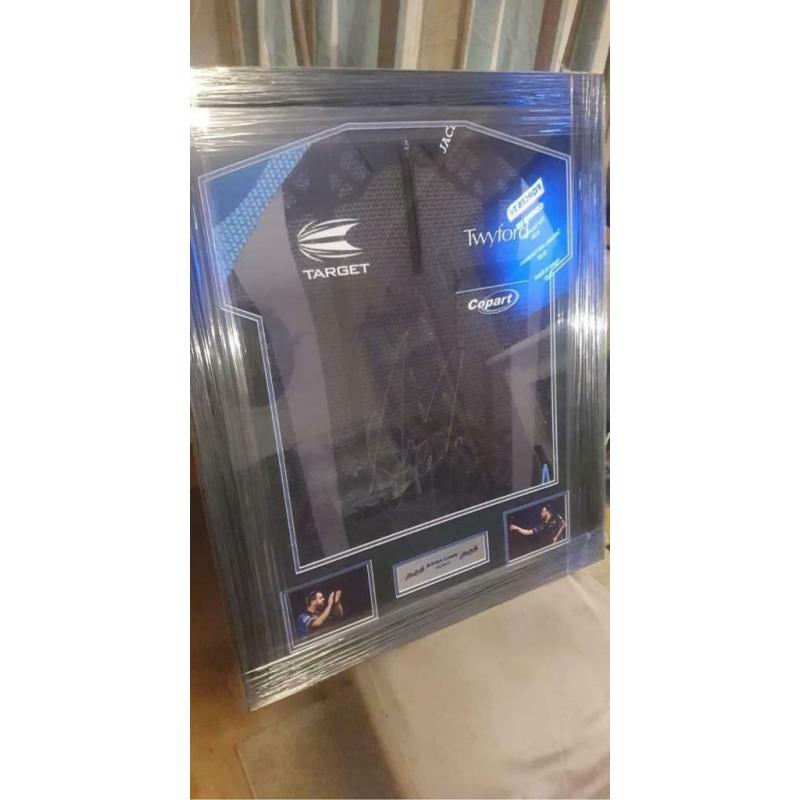 Signed framed darts shirts