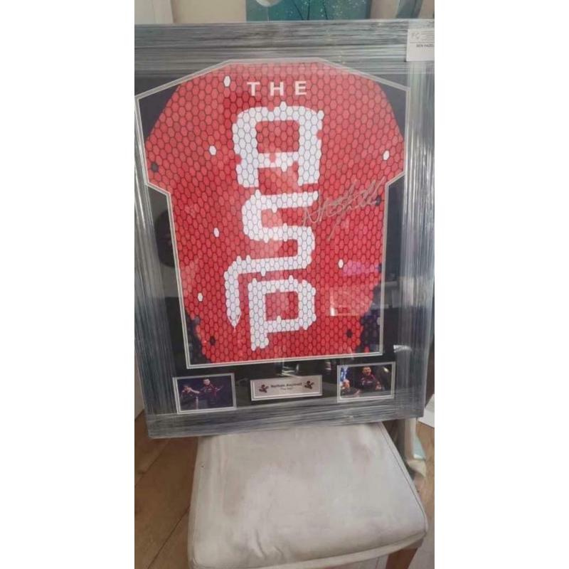 Signed framed darts shirts