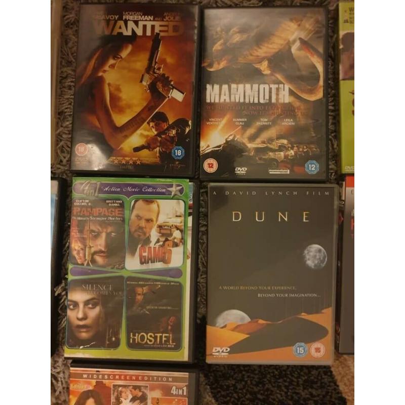 DVDS TOP COLLECTION PLUS FREE DVD PLAYER WITH IT