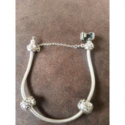 PANDORA bracelet and 2 charms