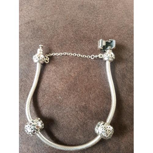 PANDORA bracelet and 2 charms