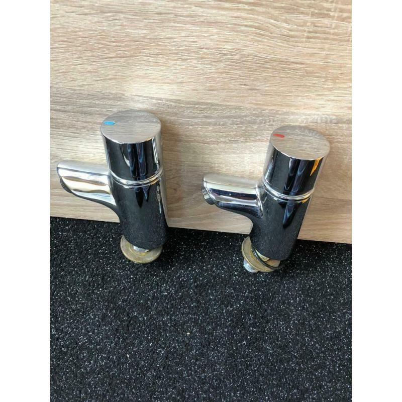 Wash basin taps