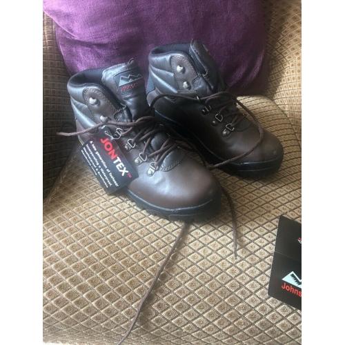 Walking boots, new and unused