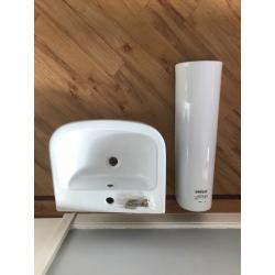 Brand new bathroom sink and pedestal