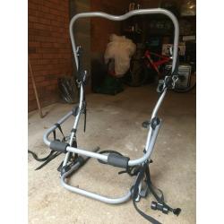 Rear-mounted clip on bike rack.