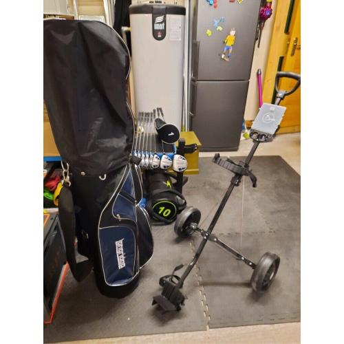 Golf clubs, bag and trolley