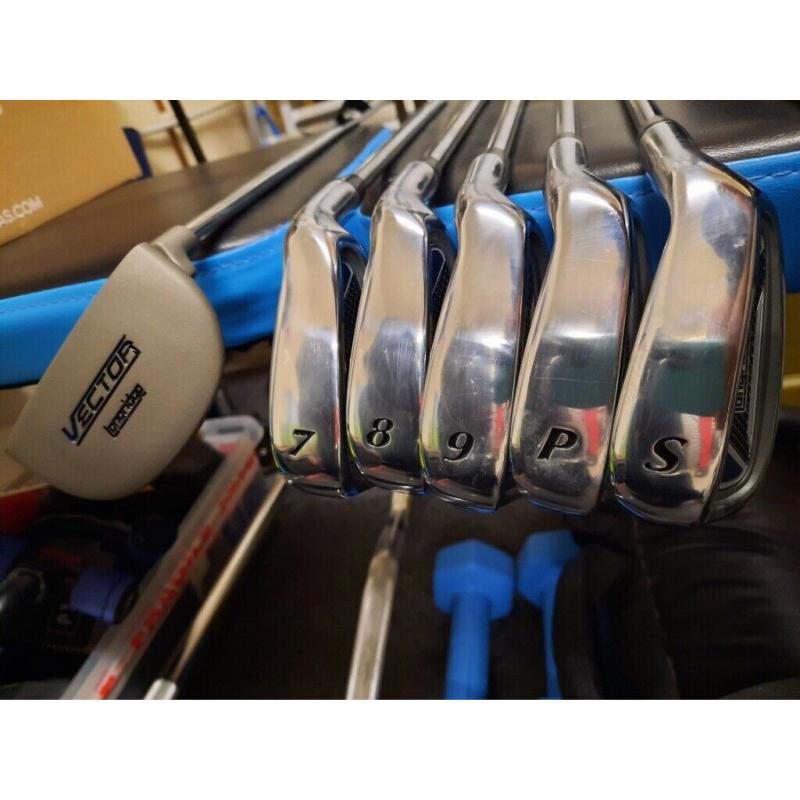 Golf clubs, bag and trolley